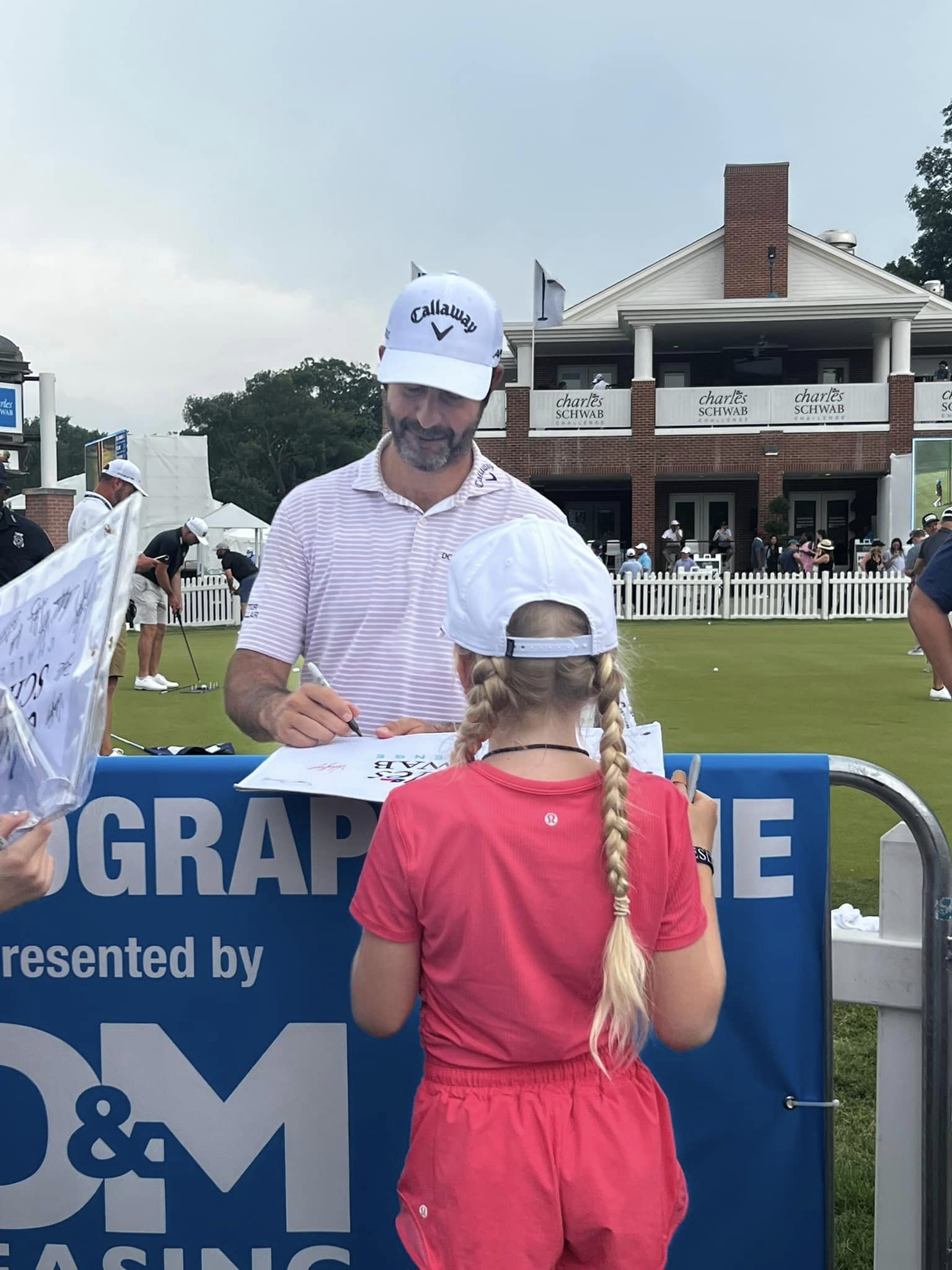 Young fans getting autographs at the Charles Schwab Challenge